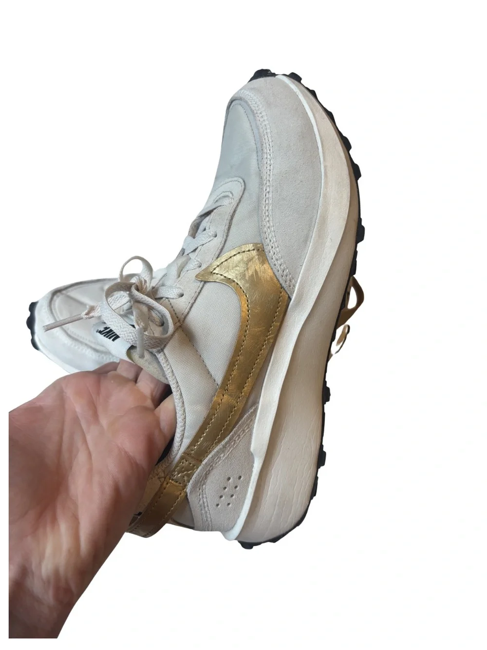Nike Waffle Debut sneakers in a light orewood brown and metallic gold colorway